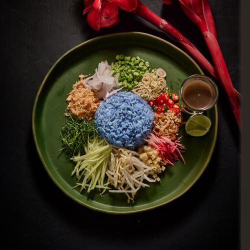 Mix Thai herbs with rice, served with fish sauce.