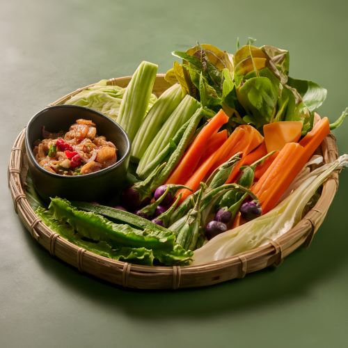 A mix of local vegetables platter, served with dried crispy shrimps dip paste.