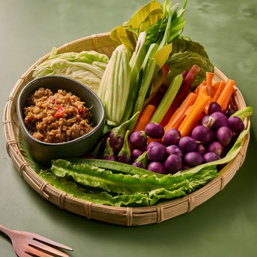 A mix of local vegetables platter, served with tamarind chili dip paste.