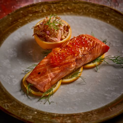 Norwegian salmon steak served with pomelo salad.