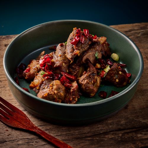 Stir fried pork ribs with chili and salt.