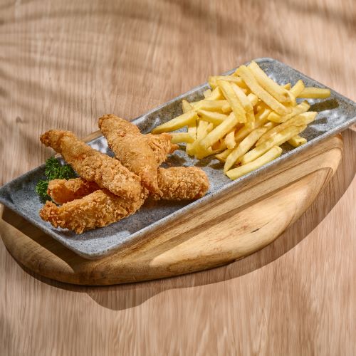 Chicken fingers served with french fries.