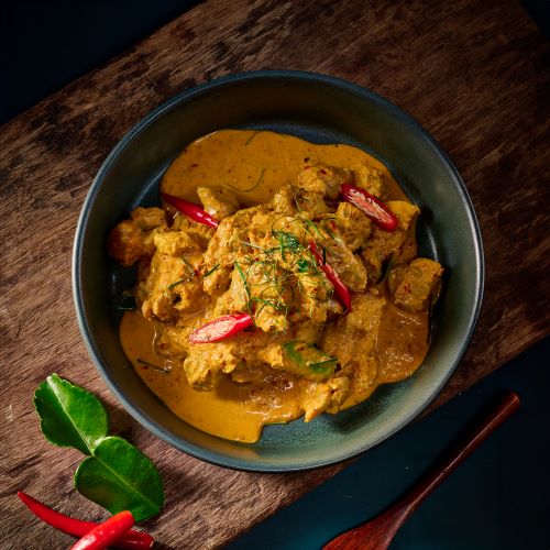 Roasted wild boar in red curry.