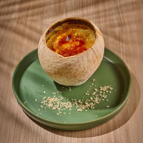 Creme Brulee served in a coconut.