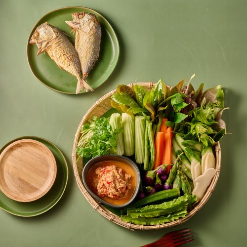 A mix of local vegetables platter, served with mackerel chili dip paste and deep fried mackerel.