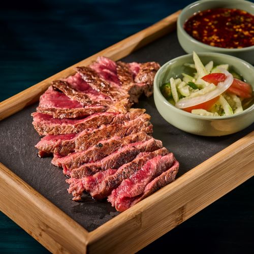 Grilled Thai beef sirlion with spicy chili paste.