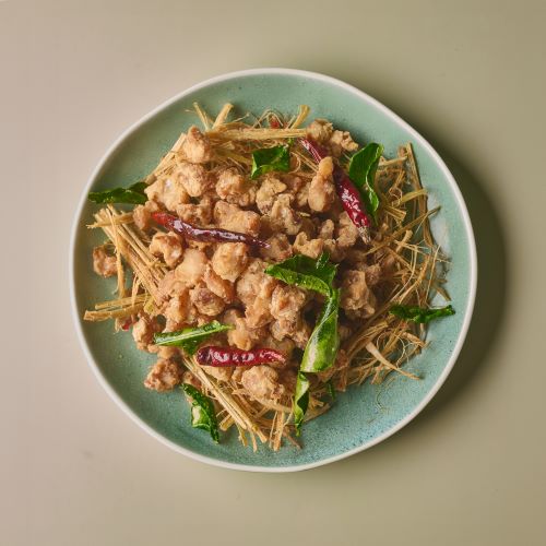 Deep fried chicken tendons with Thai herbs.