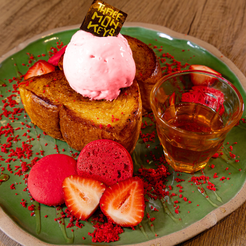 Strawberry Honey Toast, served with one scoop of strawberry ice cream.